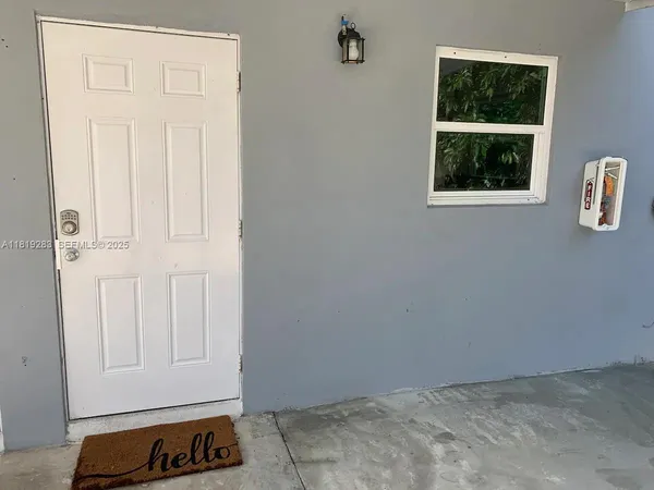 an empty room with window