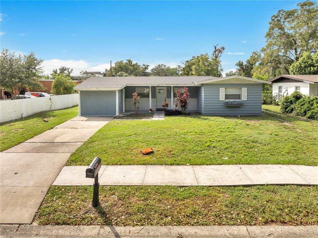 113 Jay Drive Altamonte Springs, FL 32714 - Photo 2 of 14 a view of a yard in front of the house