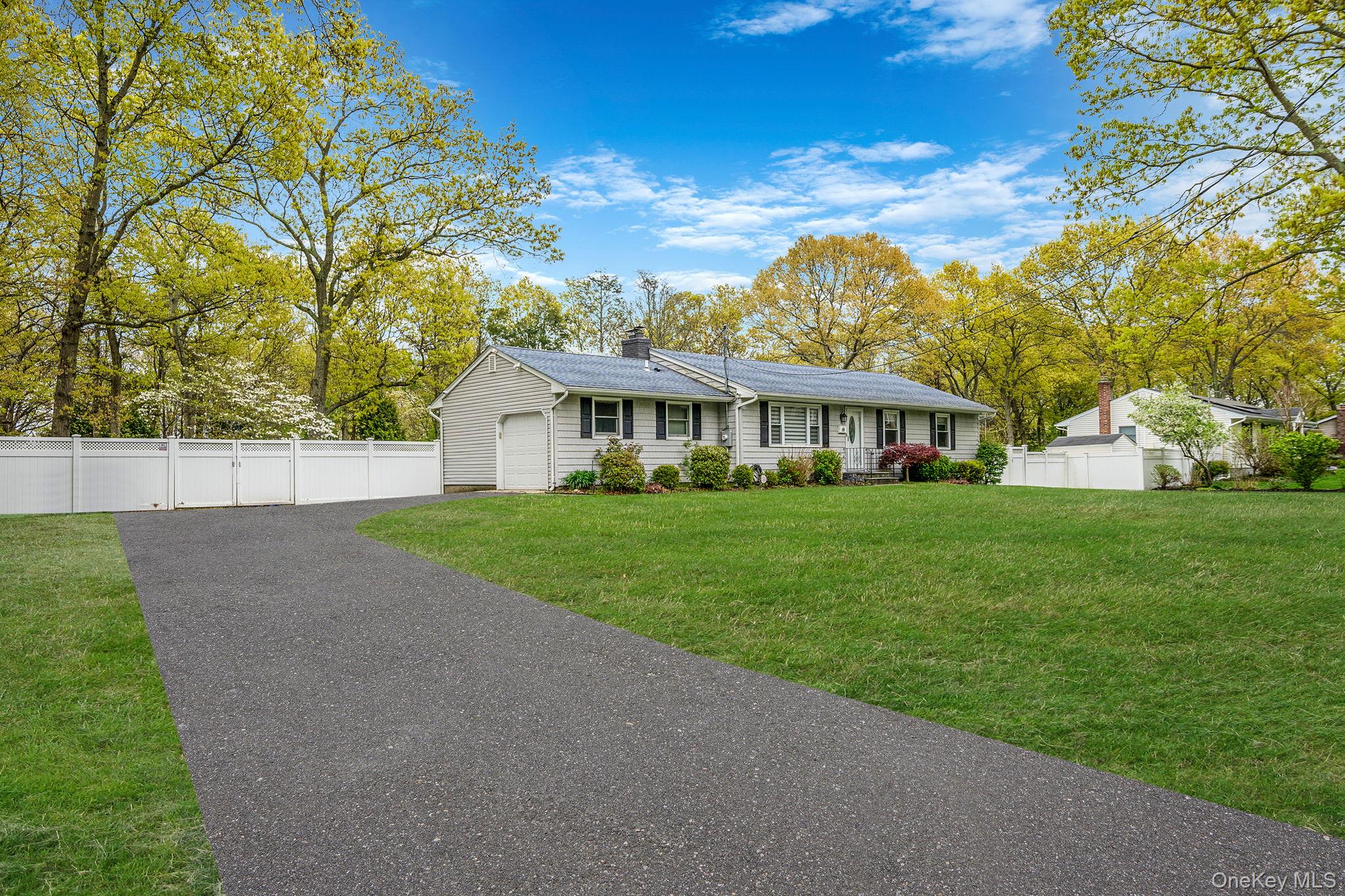 19 Pumpkin Road St. James, NY 11780 - Photo 2 of 35 a view of house that has a yard