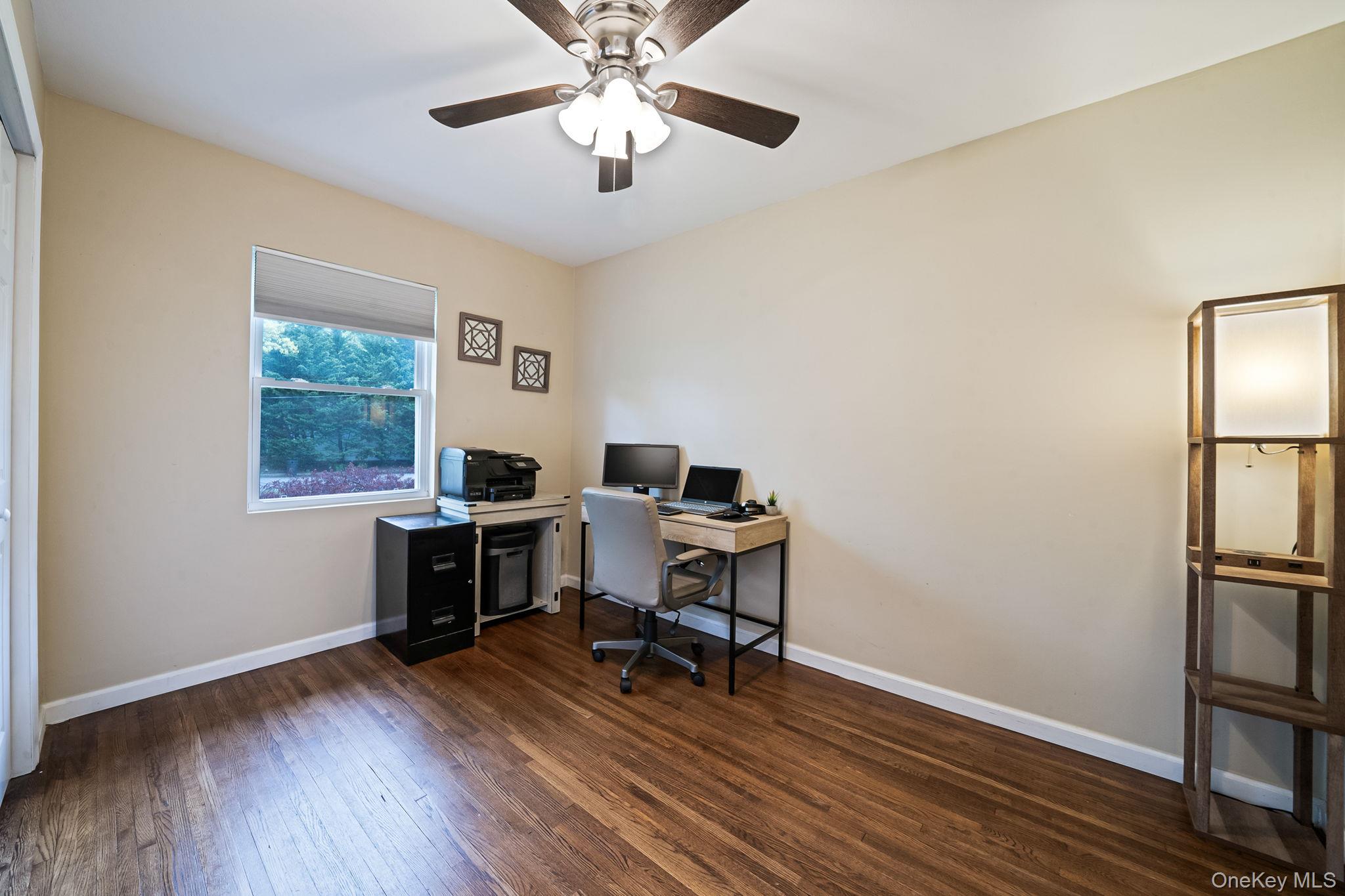 19 Pumpkin Road St. James, NY 11780 - Photo 21 of 35 a workspace with wooden floor