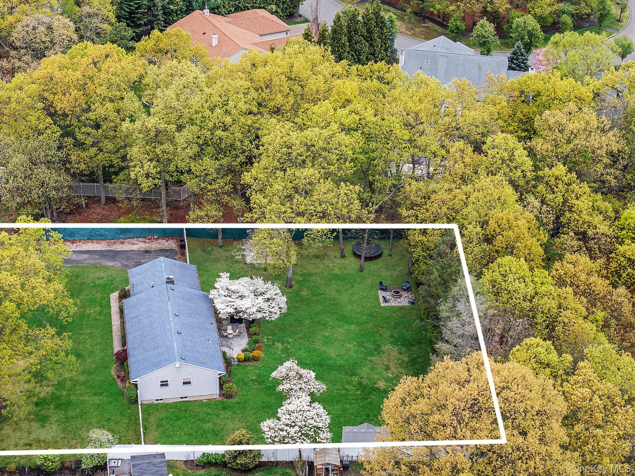 19 Pumpkin Road St. James, NY 11780 - Photo 33 of 35 an aerial view of a house with a yard basket ball court and outdoor seating