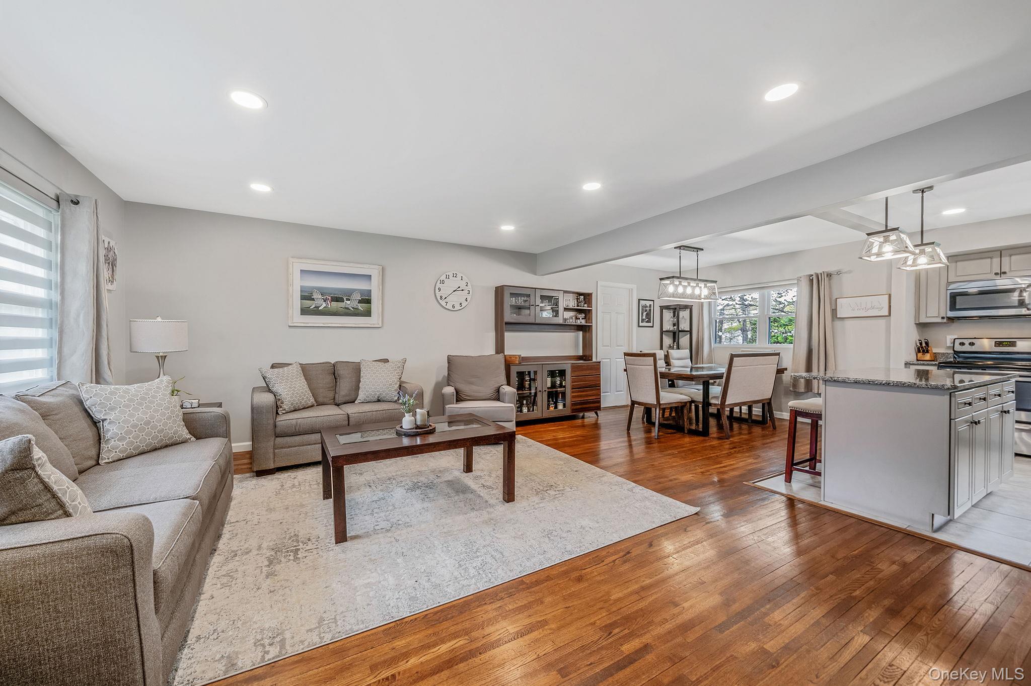 19 Pumpkin Road St. James, NY 11780 - Photo 4 of 35 a living room with furniture and wooden floor
