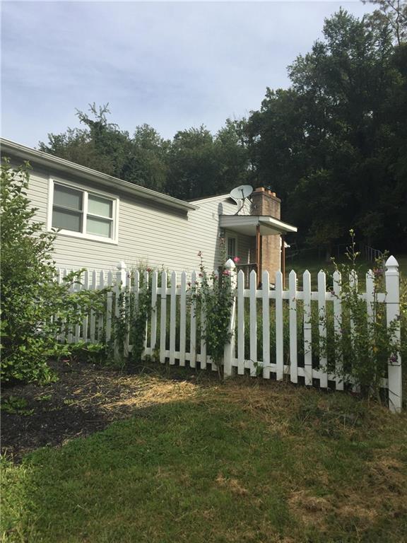 45 Fulton Road Canonsburg, PA 15317 - Photo 10 of 25 Side porch entrance that is also fenced in!