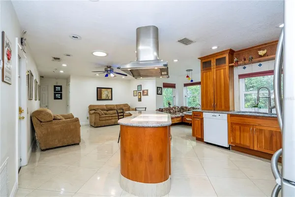 a utility room with dryer washer and other items