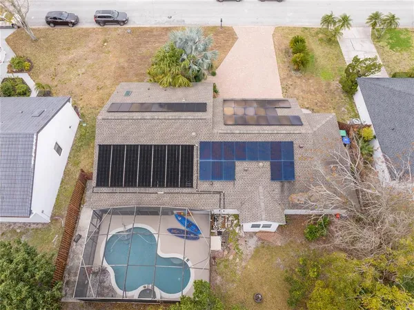 a view of a swimming pool with a patio
