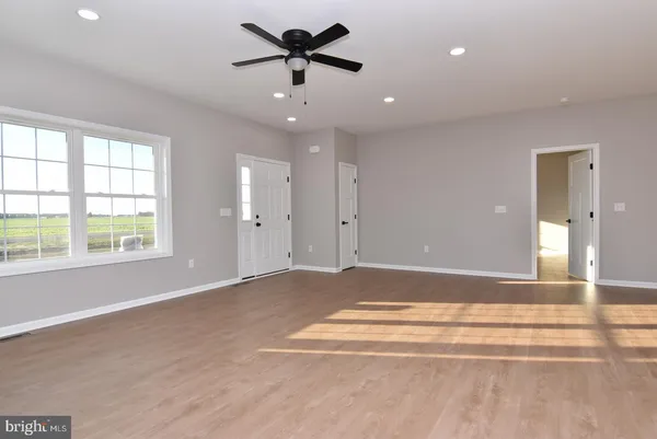 a view of an empty room and window