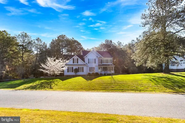 a view of a house with a swimming pool