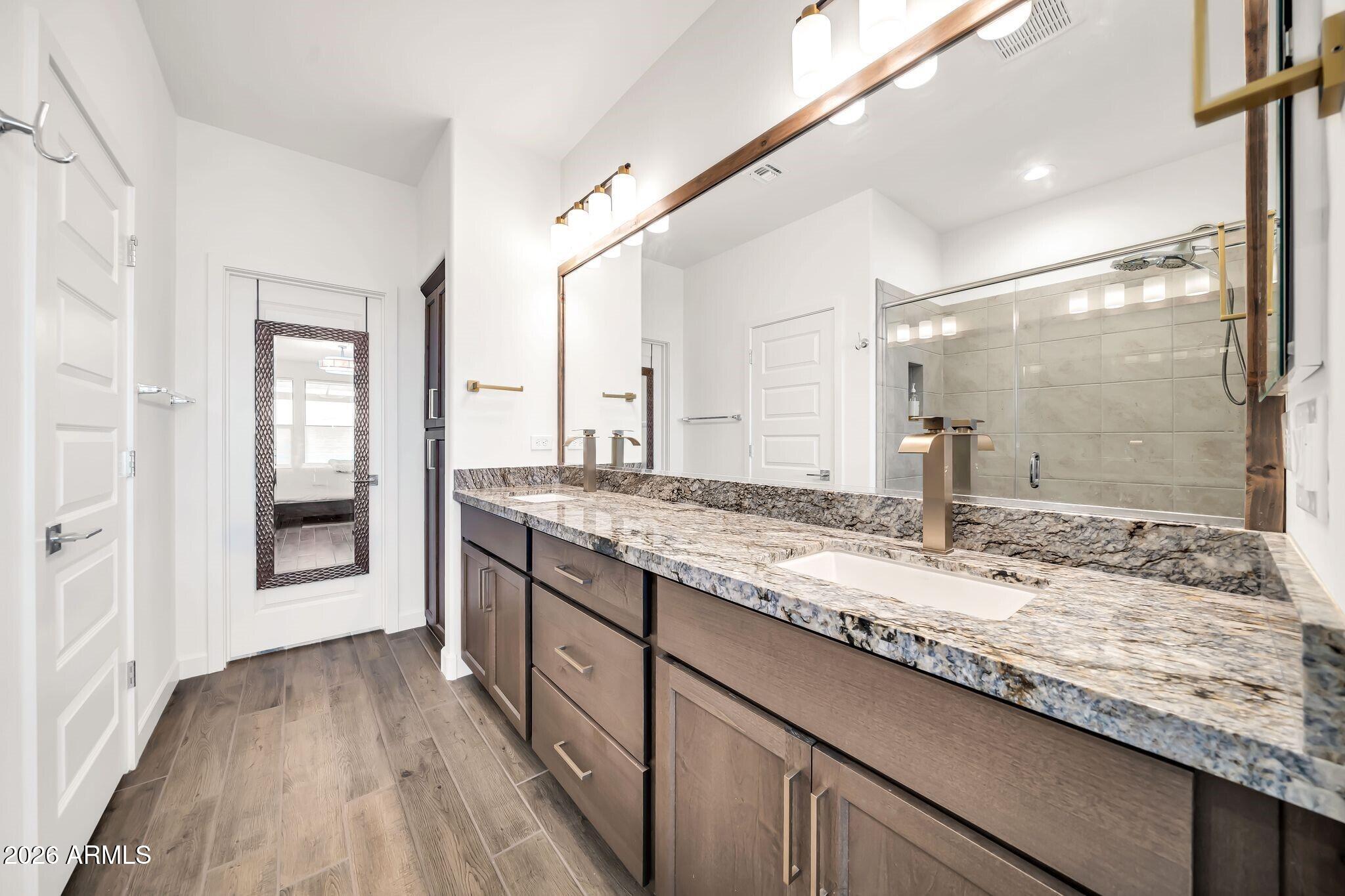 18221 East Spring Valley Court Rio Verde, AZ 85263 - Photo 19 of 49 a bathroom with granite countertop double vanity and a granite counter tops