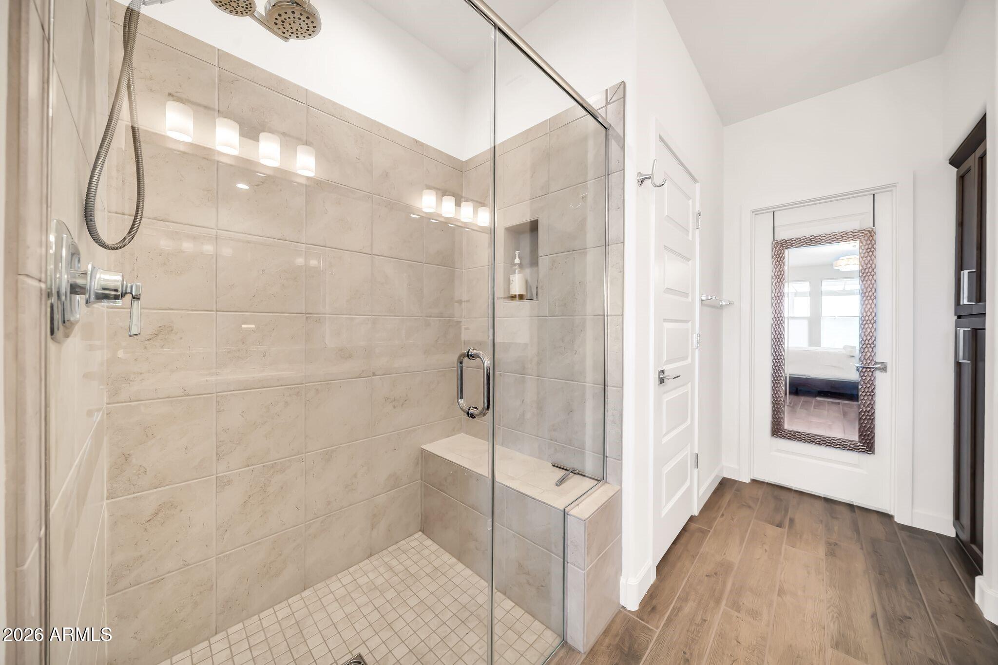 18221 East Spring Valley Court Rio Verde, AZ 85263 - Photo 20 of 49 a bathroom with a glass shower door