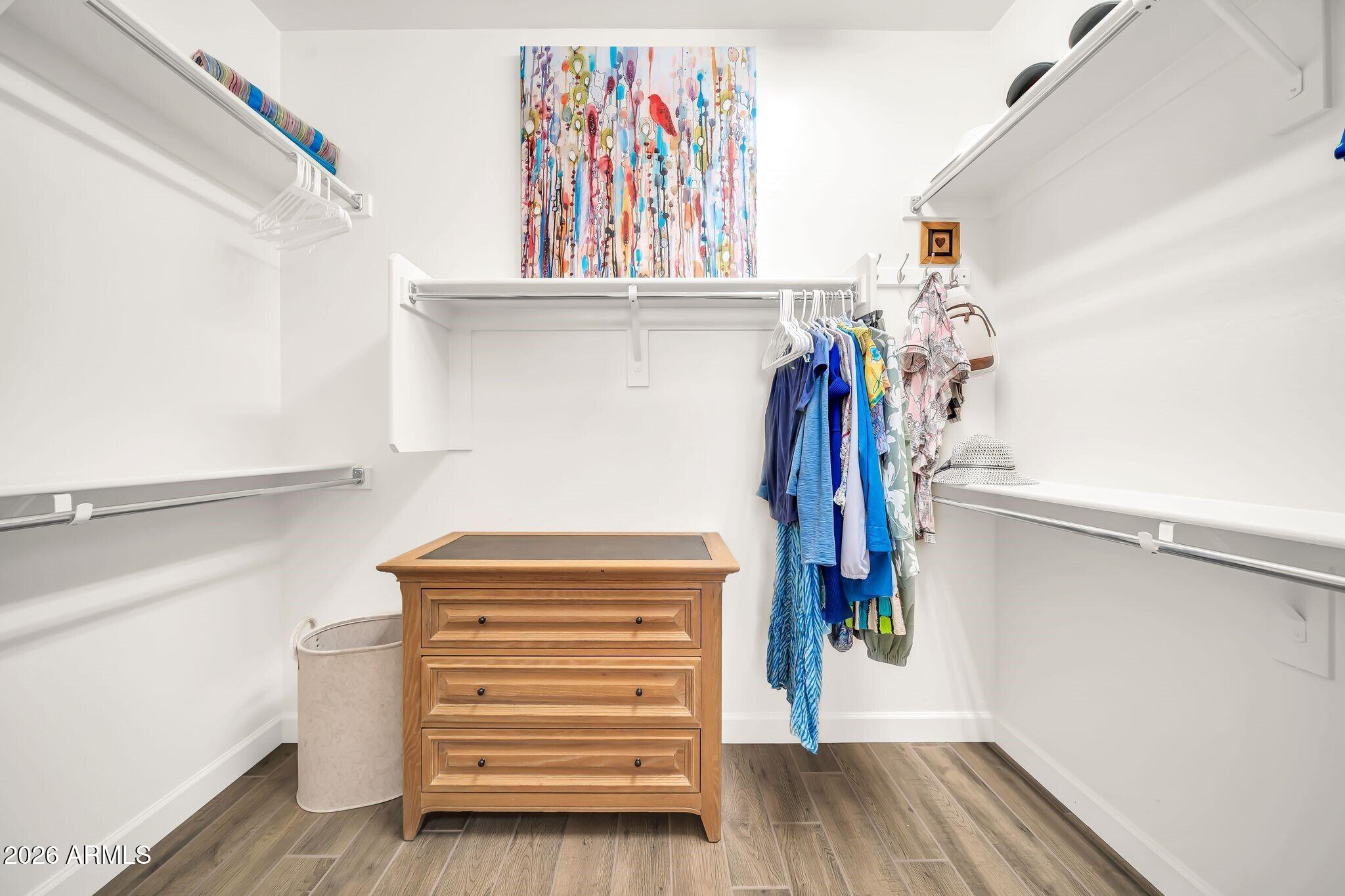 18221 East Spring Valley Court Rio Verde, AZ 85263 - Photo 21 of 49 a view of walk in closet with clothes and shoes