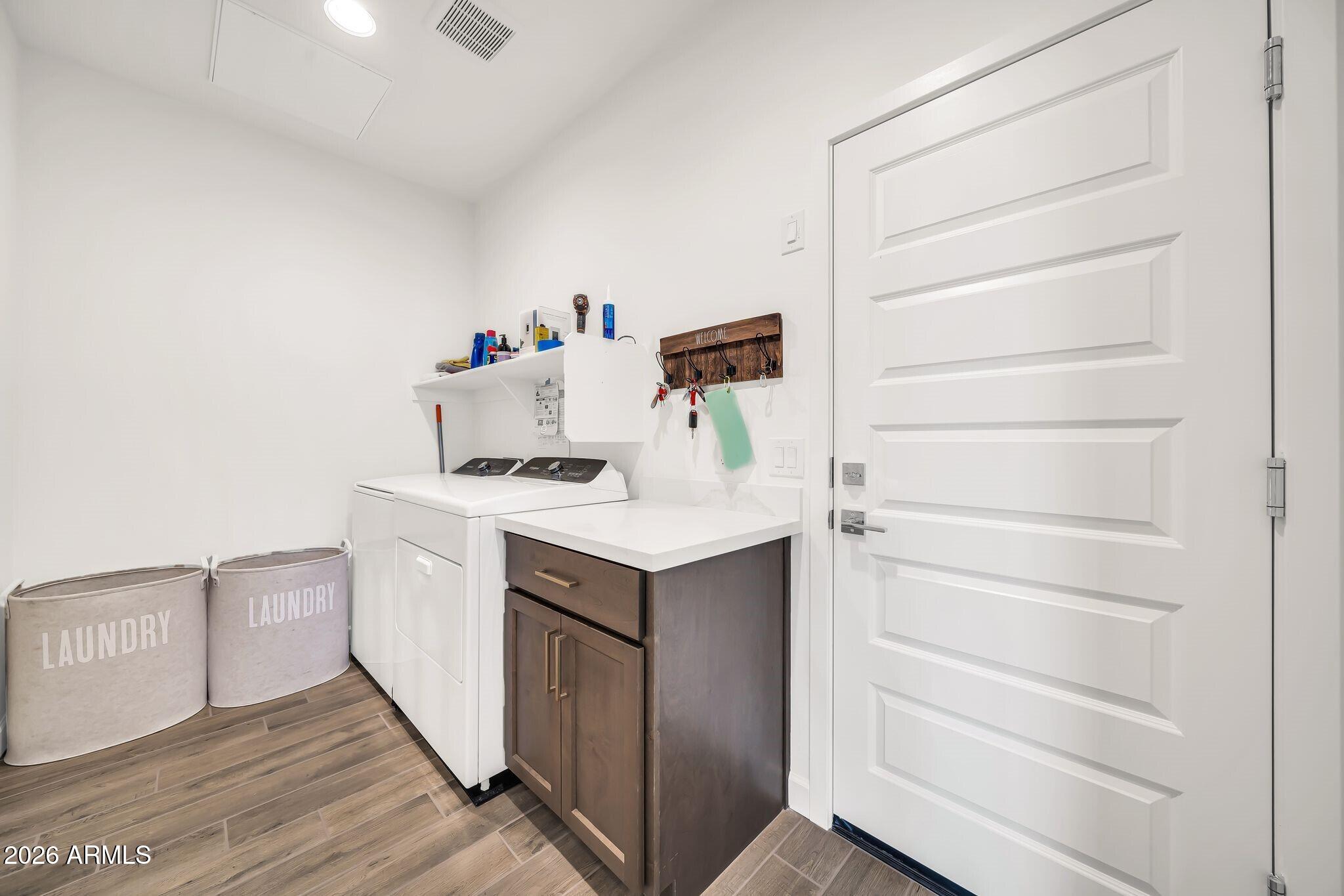 18221 East Spring Valley Court Rio Verde, AZ 85263 - Photo 26 of 49 a utility room with washer and dryer