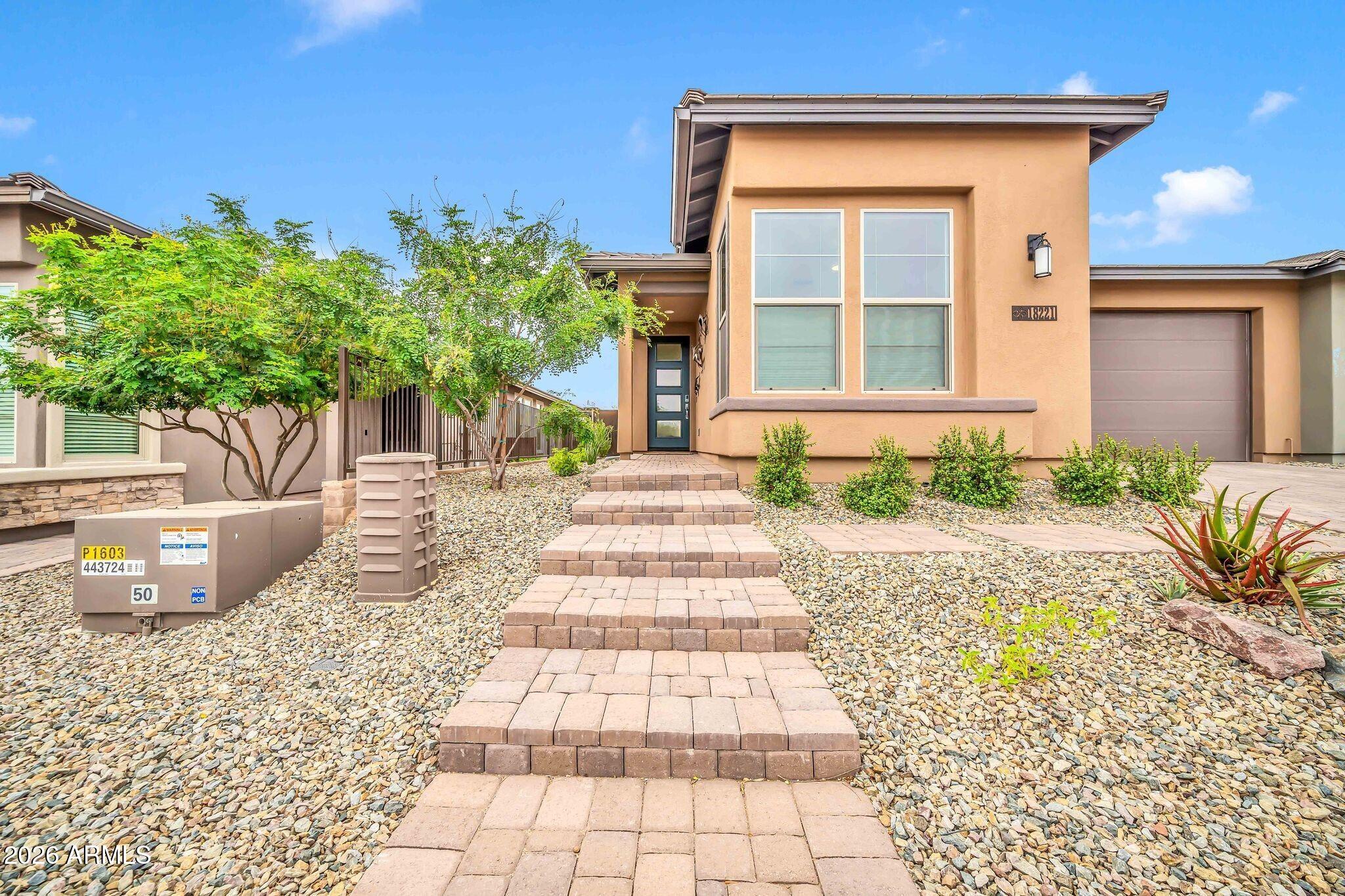 18221 East Spring Valley Court Rio Verde, AZ 85263 - Photo 6 of 49 a front view of a house