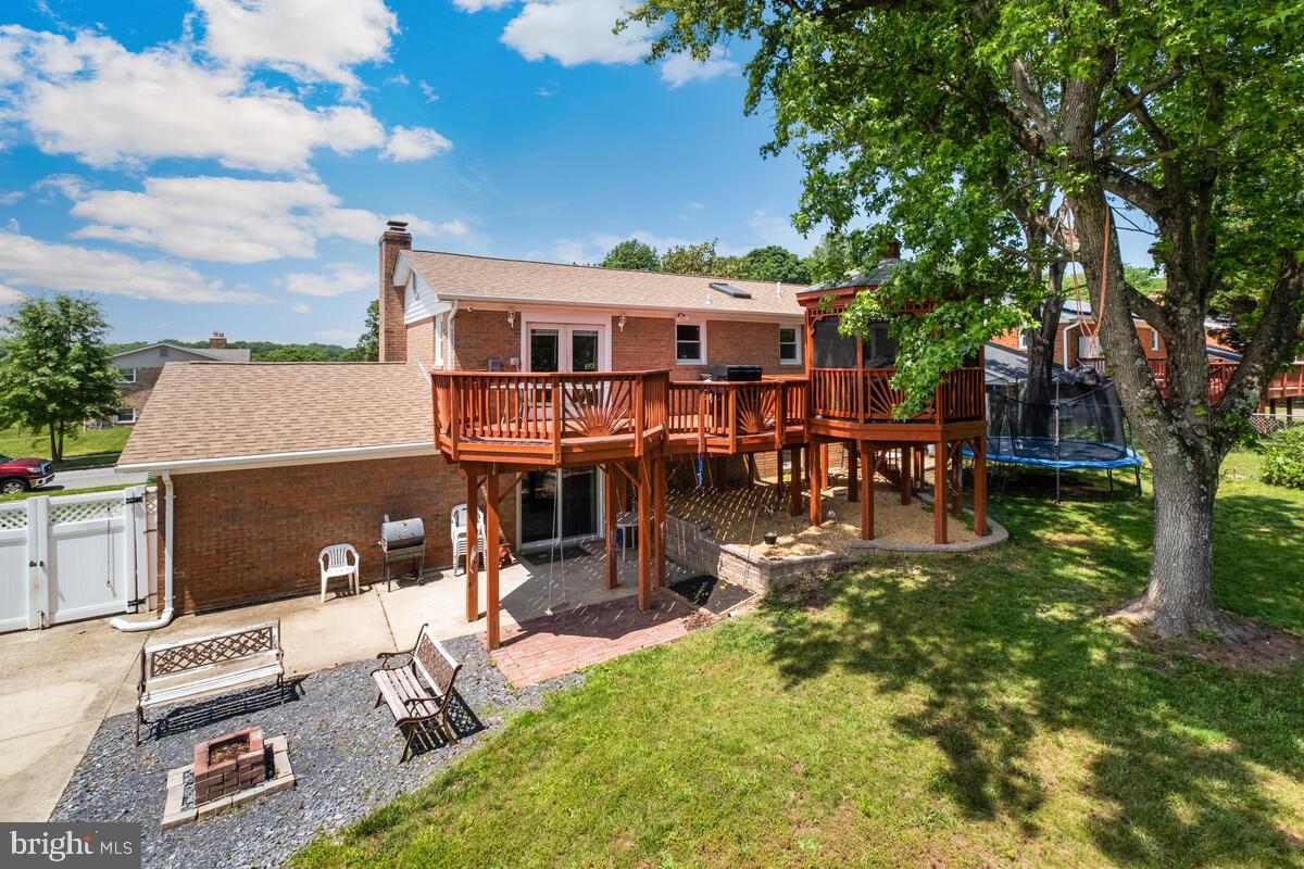 12900 Glynis Road Clinton, MD 20735 - Photo 28 of 38 an aerial view of a house with swimming pool garden and patio