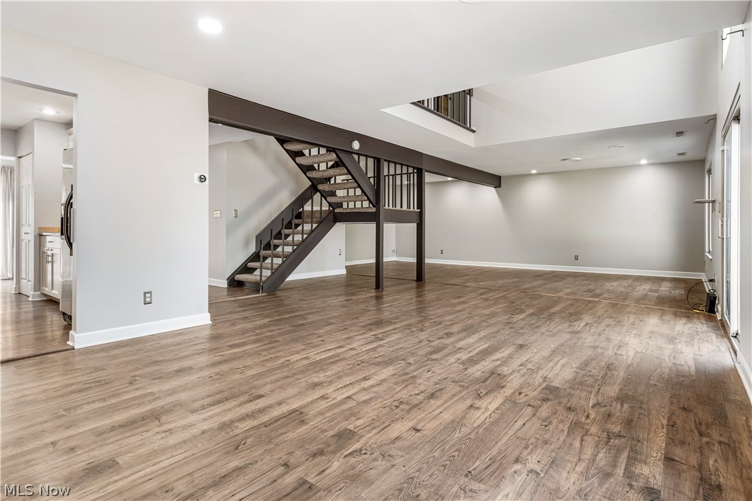 3428 South Smith Road Fairlawn, OH 44333 - Photo 25 of 30 Unfurnished living room featuring hardwood / wood-style flooring