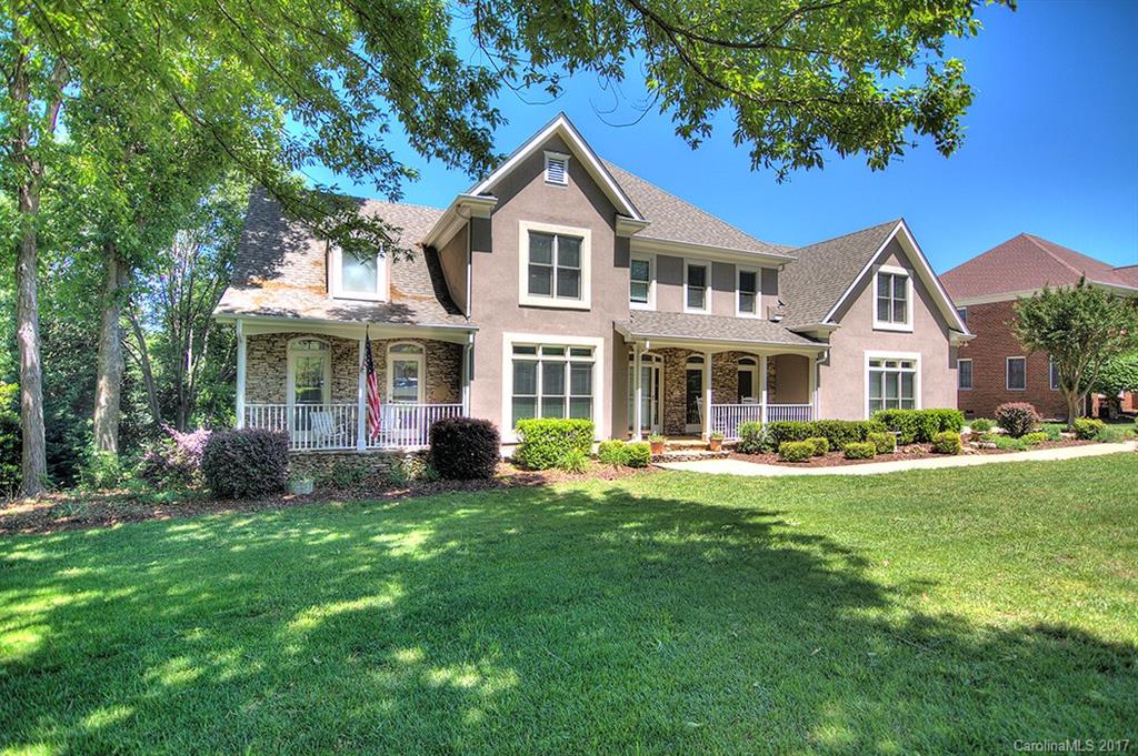 443 Beacon Knoll Lane Fort Mill, SC 29708 - Photo 1 of 24 a front view of a house with a yard