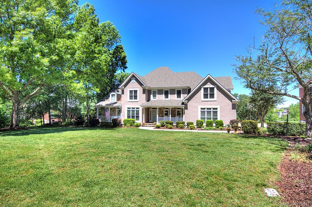 443 Beacon Knoll Lane Fort Mill, SC 29708 - Photo 2 of 24 a front view of a house with a garden