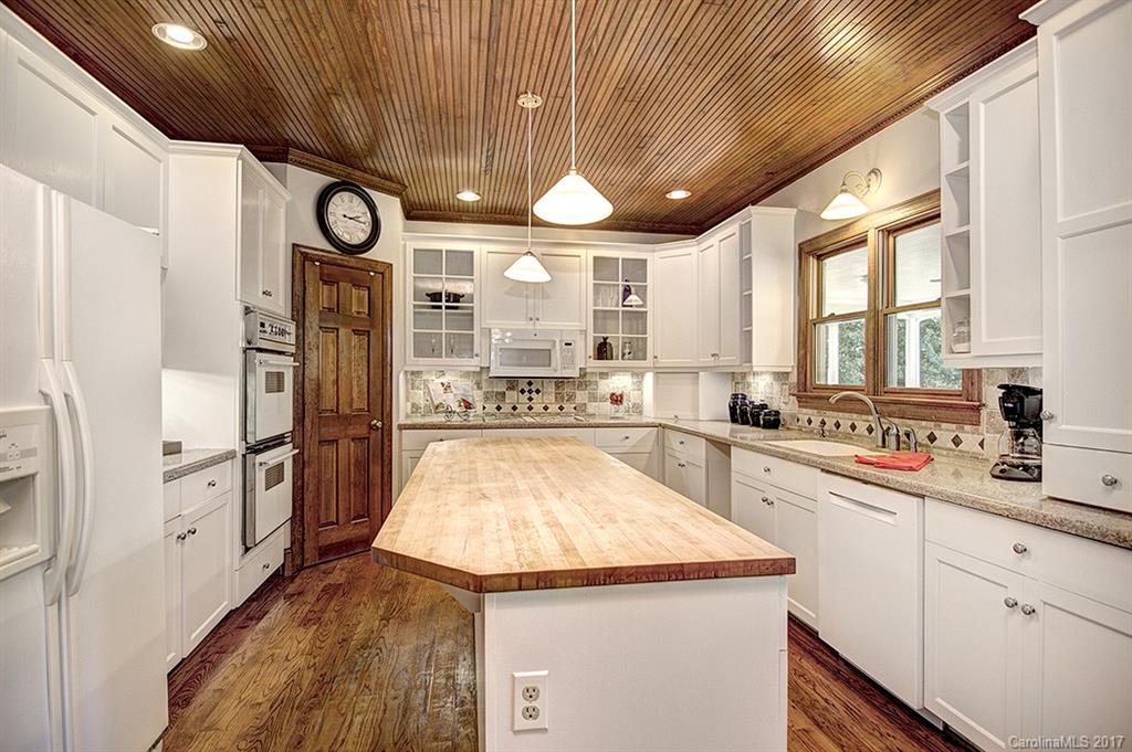 443 Beacon Knoll Lane Fort Mill, SC 29708 - Photo 11 of 24 a kitchen with a refrigerator and a sink