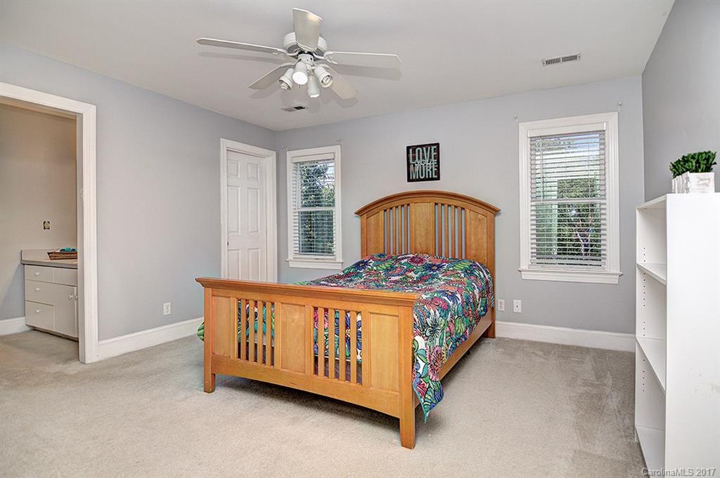 443 Beacon Knoll Lane Fort Mill, SC 29708 - Photo 17 of 24 a bed sitting in a spacious bedroom next to a window