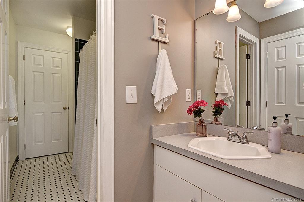 443 Beacon Knoll Lane Fort Mill, SC 29708 - Photo 18 of 24 a bathroom with a sink and a mirror