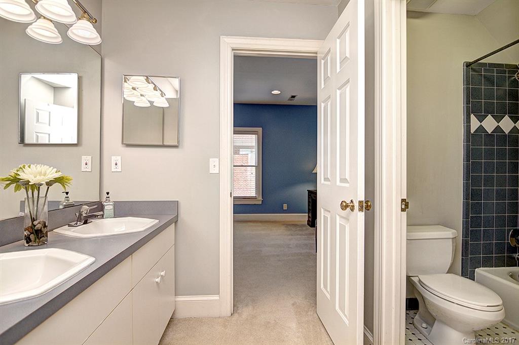 443 Beacon Knoll Lane Fort Mill, SC 29708 - Photo 20 of 24 a en suite bathroom with a granite countertop sink toilet and shower