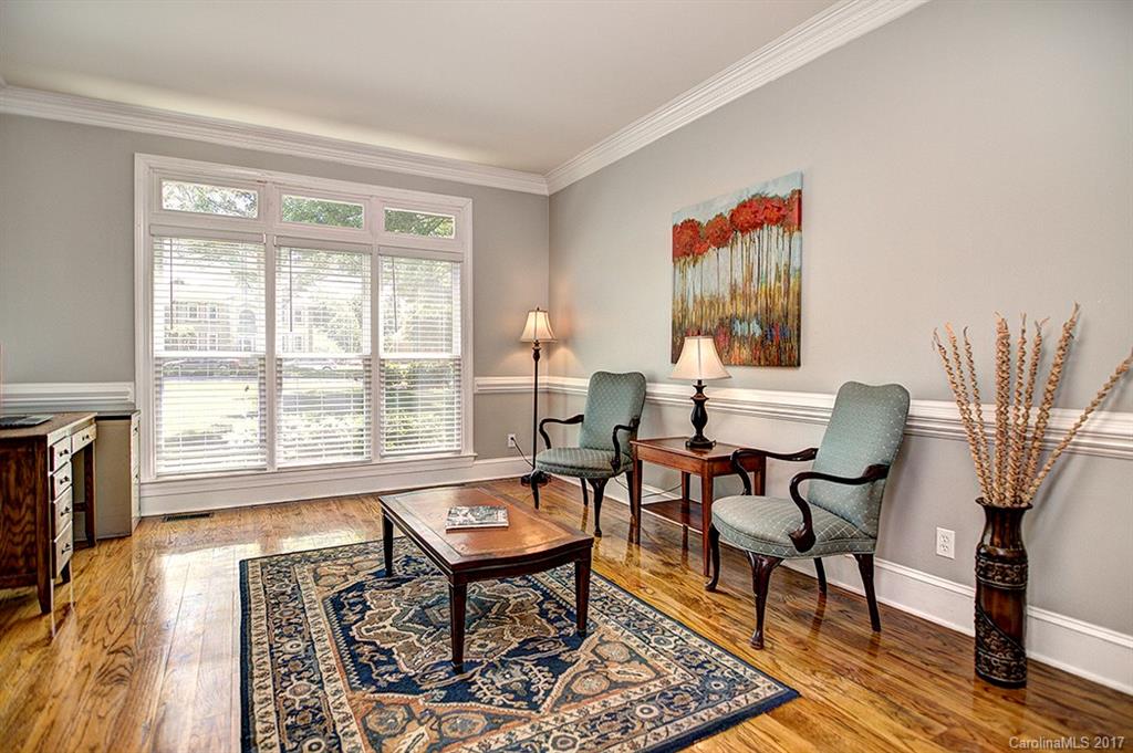 443 Beacon Knoll Lane Fort Mill, SC 29708 - Photo 6 of 24 a living room with furniture and a floor to ceiling window