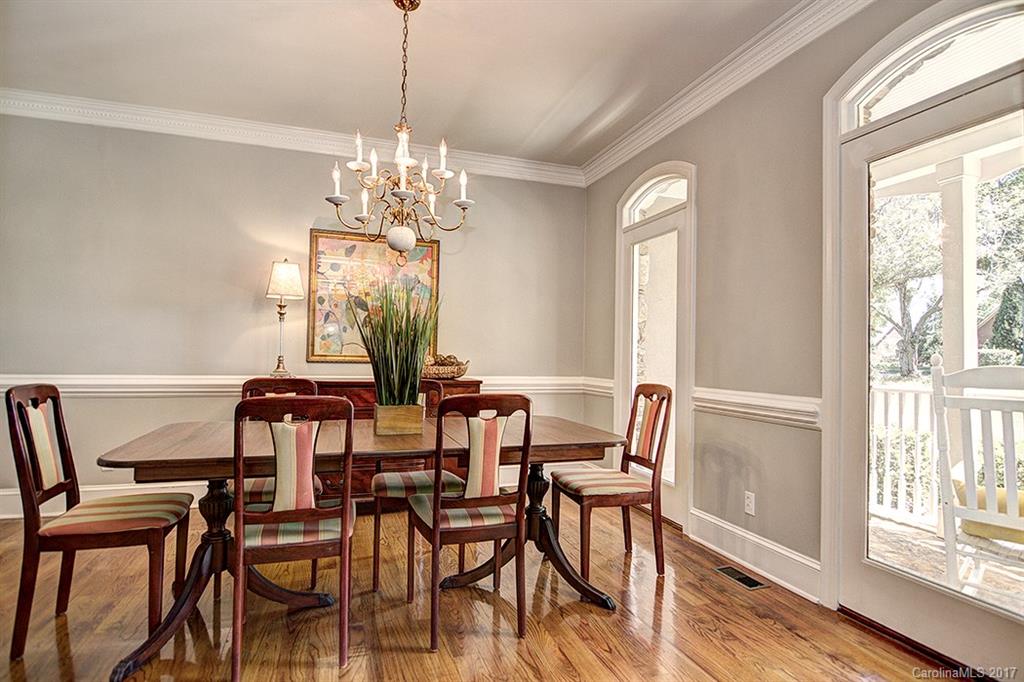 443 Beacon Knoll Lane Fort Mill, SC 29708 - Photo 7 of 24 a view of a dining room with furniture wooden floor and chandelier