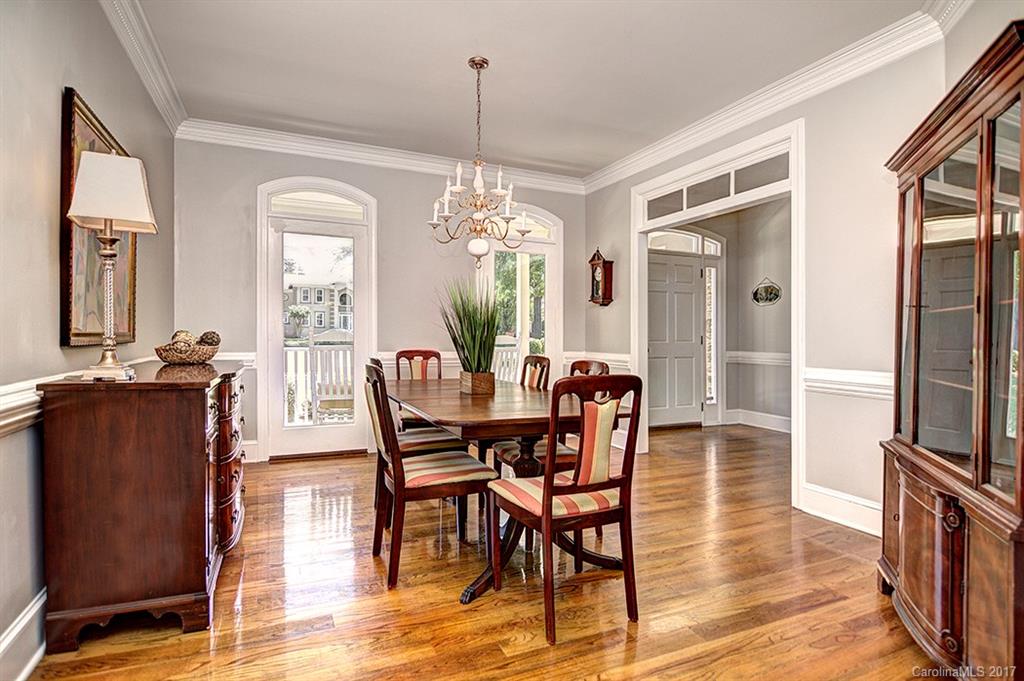 443 Beacon Knoll Lane Fort Mill, SC 29708 - Photo 8 of 24 a view of a dining room with furniture and a chandelier