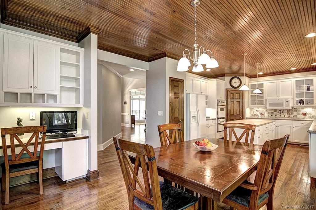 443 Beacon Knoll Lane Fort Mill, SC 29708 - Photo 9 of 24 a view of a dining room with furniture window and wooden floor