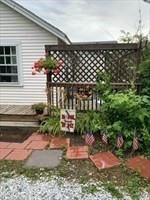 9 A Worcester Avenue, Unit 9A Hudson, MA 01749 - Photo 2 of 10 a view of a backyard