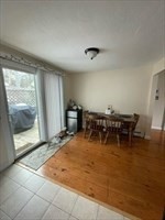 9 A Worcester Avenue, Unit 9A Hudson, MA 01749 - Photo 4 of 10 a view of a room with furniture and window