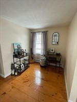 9 A Worcester Avenue, Unit 9A Hudson, MA 01749 - Photo 5 of 10 a bedroom with furniture and a window