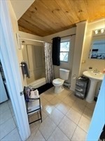 9 A Worcester Avenue, Unit 9A Hudson, MA 01749 - Photo 10 of 10 a view of bathroom with a sink and mirror