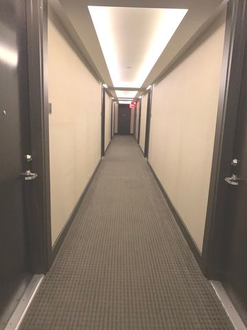 a view of hallway with stairs