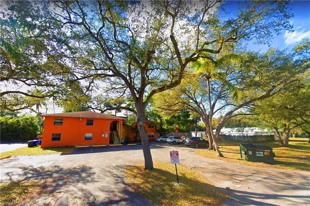 2524 Congress Street, Unit 4 Fort Myers, FL 33901 - Photo 1 of 24 a street view with large trees