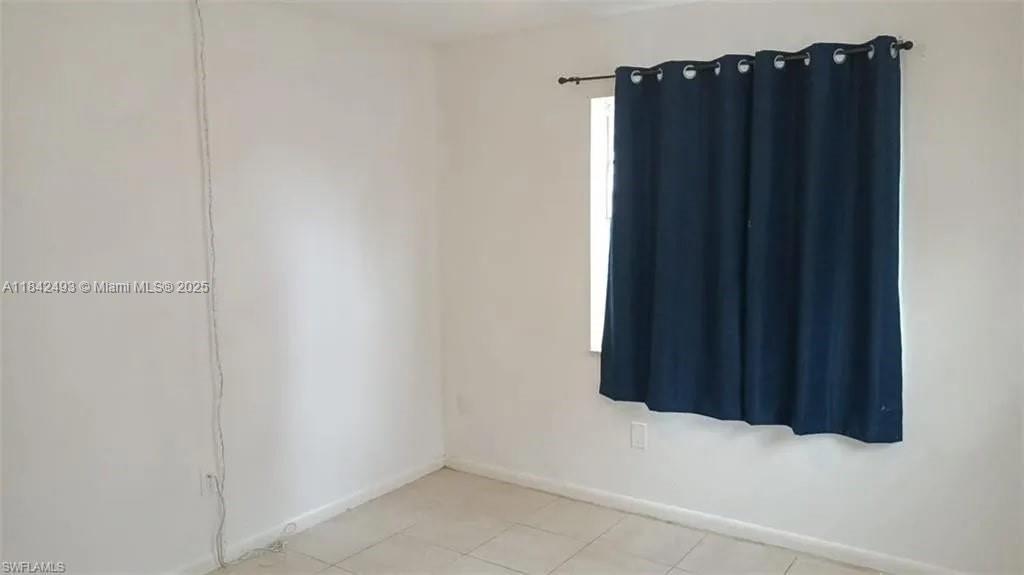 2524 Congress Street, Unit 4 Fort Myers, FL 33901 - Photo 17 of 24 a view of a black gate