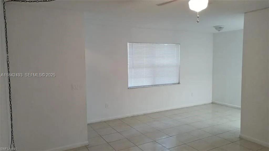 2524 Congress Street, Unit 4 Fort Myers, FL 33901 - Photo 3 of 24 an empty room with a window