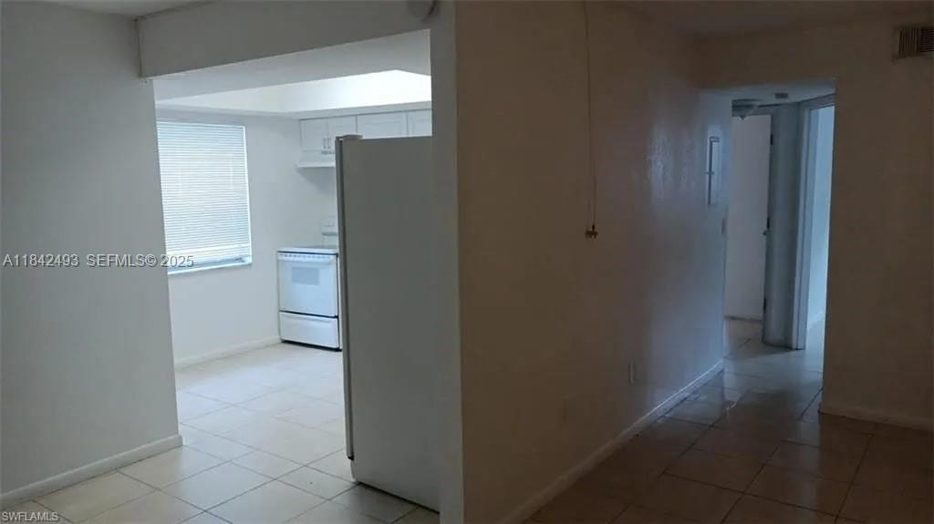 2524 Congress Street, Unit 4 Fort Myers, FL 33901 - Photo 7 of 24 a view of a hallway with an empty space