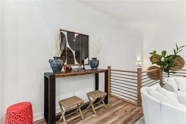 a bedroom with a bed and flat screen tv