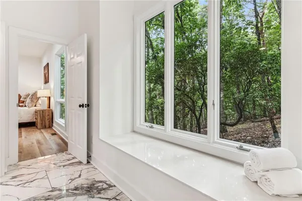 a view of a balcony with chairs