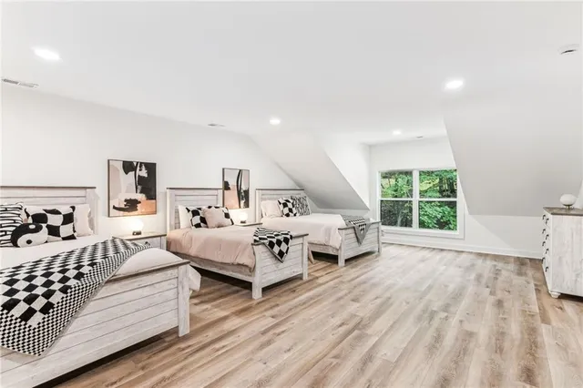 a view of a backyard with table and chairs