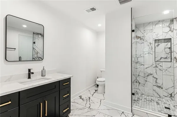 a view of a backyard with sitting area