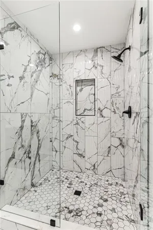 a view of a chairs and tables in the backyard