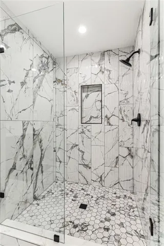 a view of a chairs and tables in the backyard