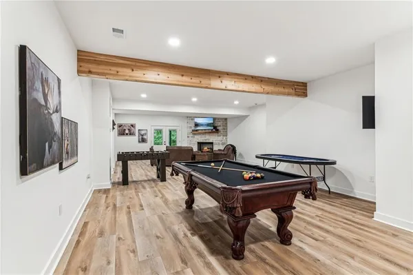 a view of a green field with lots of bushes