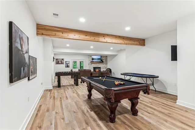 a view of a green field with lots of bushes