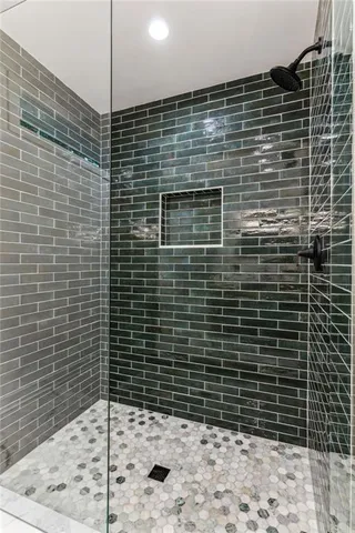 a view of a big yard with lots of bushes