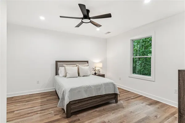 a view of an empty space and basketball court