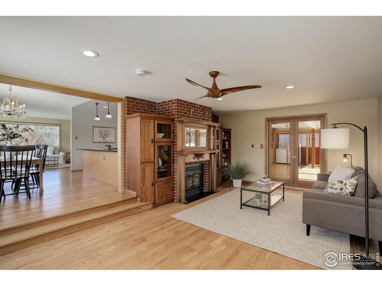 7714 Baseline Road Boulder, CO 80303 - Photo 19 of 38 a living room with furniture and a flat screen tv