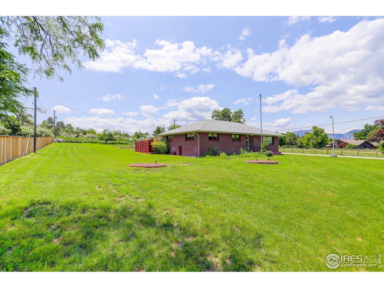 7714 Baseline Road Boulder, CO 80303 - Photo 2 of 38 a view of a house with a big yard