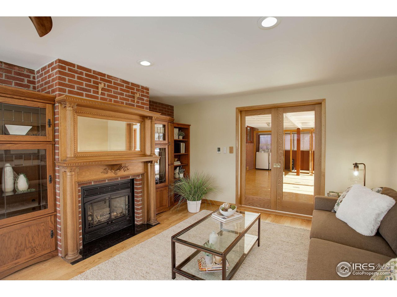 7714 Baseline Road Boulder, CO 80303 - Photo 22 of 38 a living room with furniture and a fireplace